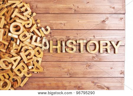 Word history made with wooden letters