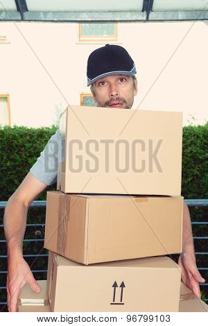 Overstrained Postman With Parcels