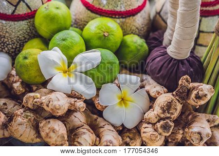 Spa, Heath Care Set Of Essential Oils, Soap, Ginger, Turmeric Roots And Spices On A Wooden Tray