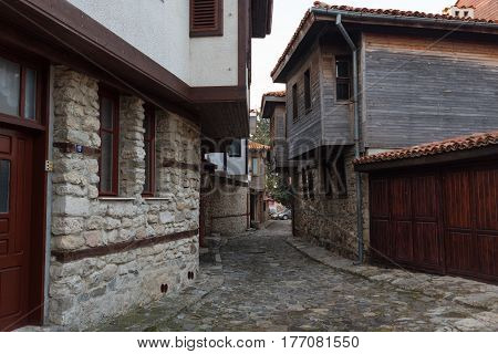 NESEBAR, BULGARIA - February 05, 2017: Old Bulgarian houses in the town of Nesebar. Nesebar is a tourist resort at the Black Sea coast. In 1956 Nesebar was declared as museum city, archaeological and architectural reservation by UNESCO.