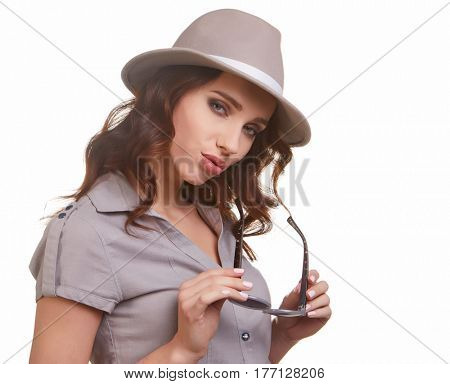 Young Woman with spring hat against white  background 