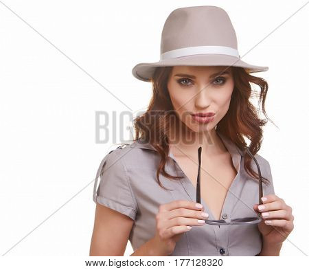 Young Woman with spring hat against white  background 