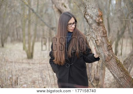Portrait Of A Beautiful Girl In A Dark Forest