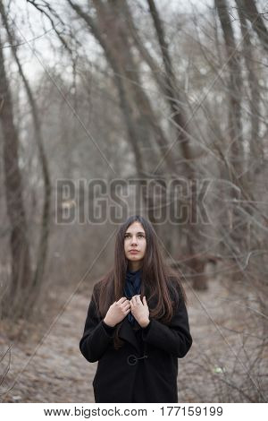 Portrait Of A Beautiful Girl In A Dark Forest