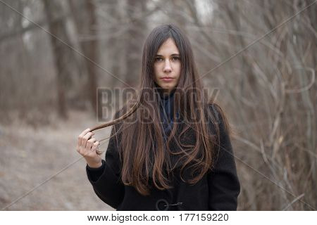 Portrait Of A Beautiful Girl In A Dark Forest