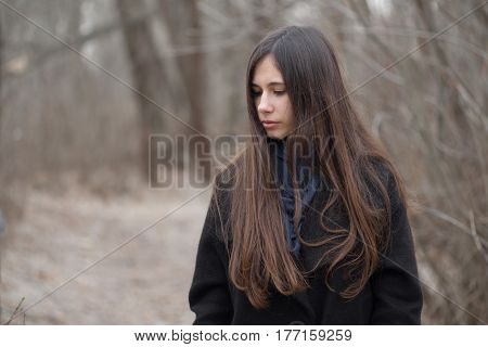 Portrait Of A Beautiful Girl In A Dark Forest