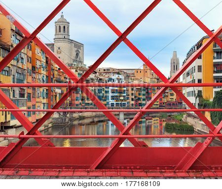 historical jewish quarter in Gerona, view through Eiffel Bridge at sunrise, Barcelona, Spain, Catalonia