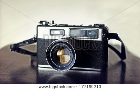 Photography Vintage Slr camera on a wooden surface Karachi Pakistan. 30-03-2017