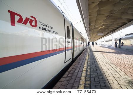 Moscow, Russia - March 14, 2017: Leningradsky railway station, the platform with a standing high-speed train Sapsan