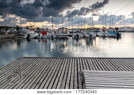 SOZOPOL, BULGARIA - JULY 12, 2016: Amazing Sunset at the port of Sozopol, Burgas Region, Bulgaria
