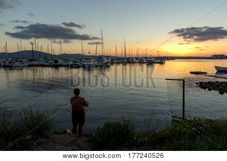 SOZOPOL, BULGARIA - JULY 13, 2016: Amazing Sunset at the port of Sozopol, Burgas Region, Bulgaria