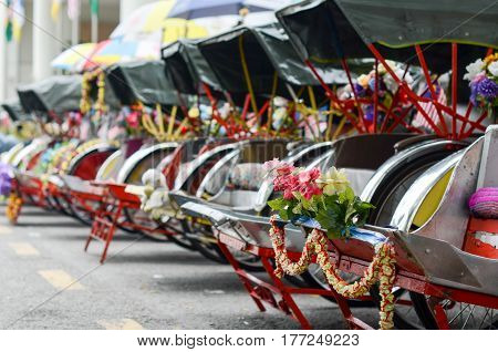 Pahang, Malaysia. Vintage Trishaw stop beside road for service traveller