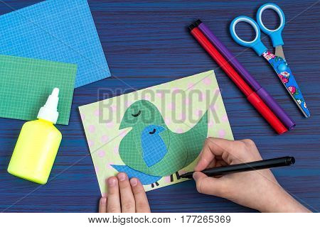 Making a greeting card for Mother's Day. Children's art project. DIY concept. Step-by-step photo instruction. Step 7. Drawing image details