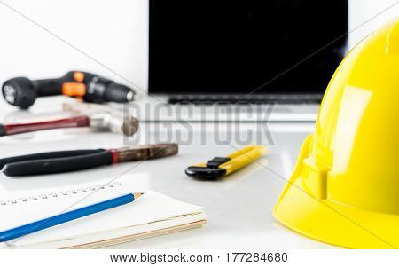 Repairman construction helment and screwdriver with computer