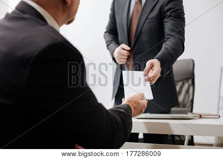 My voluntary withdrawal. Confident diligent honest employee giving the dismiss notice to employer and sitting in the office while having conversation