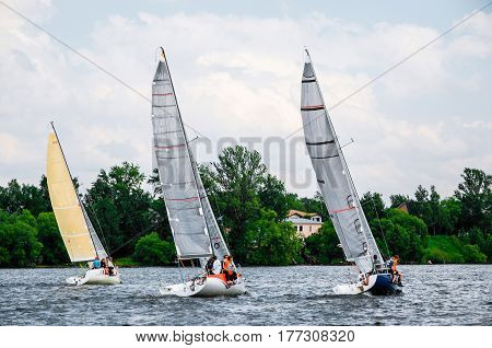 Moscow , May 24 : Public open.Team athletes participating in the sailing competition - match race , held in Moscow on Pirogov Reservoir May 24, 2016