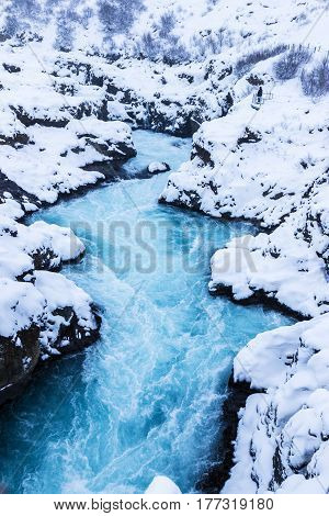 Beautiful Bruarfoss waterfall wit azure water in wintertime Iceland