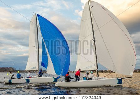 Konakovo , April 19 : Public open. Team athletes participating in the sailing competition - match race , held in Konakovo on river Volga April 19, 2016