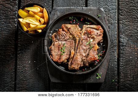 Tasty Chips And Tbone Steak With Herbs And Salt
