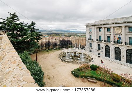 Avila Spain - November 11 2014: The Medieval Walls of Avila. The old city and its extramural churches were declared a World Heritage site by UNESCO