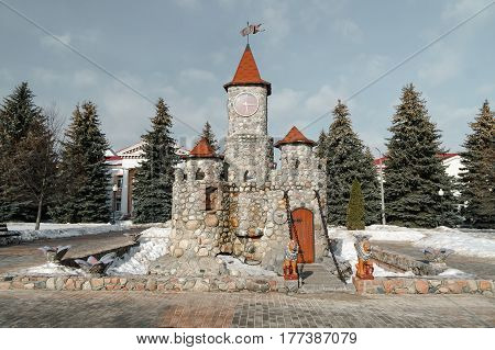 Old castle in the park with trees
