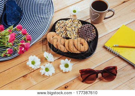 Coffee Espresso Stands On A Wooden Table With Cookies, Pad And Pencil.