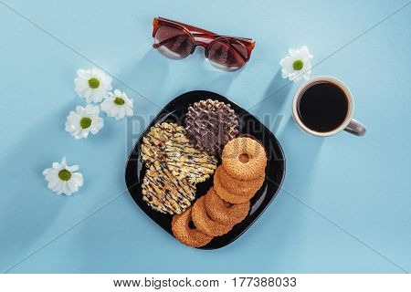Coffee Espresso Stands On A Wooden Table With Cookies, Pad And Pencil.