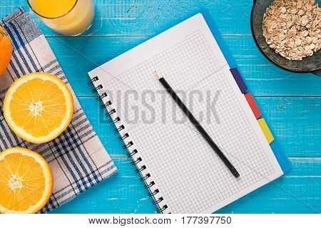 Oatmeal breakfast with orange juice. Healthy breakfast. View from above. Copy space