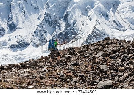 Trekker In Front Of Manaslu Glacier On Manaslu Circuit Trek In Nepal