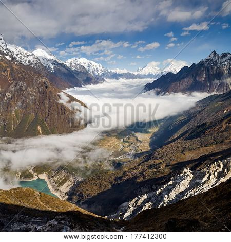 Manaslu valley covered with clouds on Manaslu circuit trek in Nepal