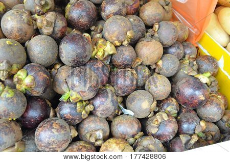 mangostine fruits at asian street food market