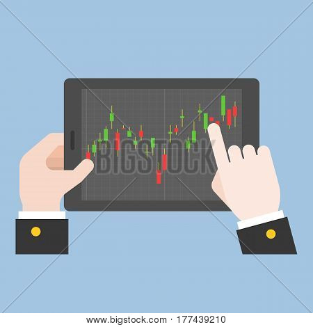 business hand tab on tablet screen with candle stick of market stock, making money online from forex or trading concept, flat design