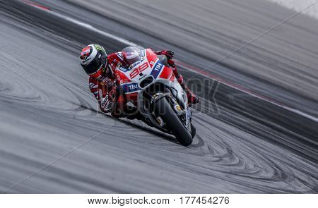 SEPANG MALAYSIA - JANUARY 30 2017 : Ducati Team rider Jorge Lorenzo taking a corner during 2017 MotoGP pre-season test (Winter Test) at the Sepang International Circuit.