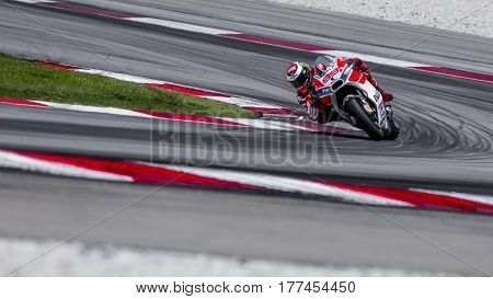SEPANG MALAYSIA - JANUARY 30 2017 : Ducati Team rider Jorge Lorenzo taking a corner during 2017 MotoGP pre-season test (Winter Test) at the Sepang International Circuit.
