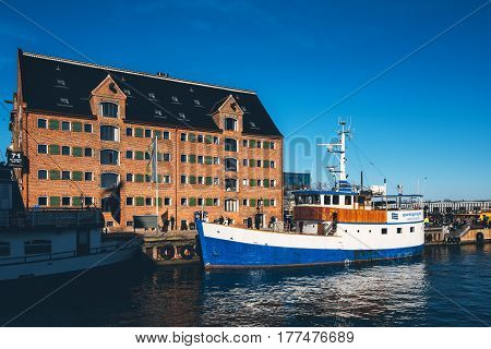 COPENHAGEN DENMARK - MARCH 11 2017: Copenhagen Denmark typical architecture. Picture is depicting 71 Nyhavn Hotel housed in a 200-year-old canalside warehouse.