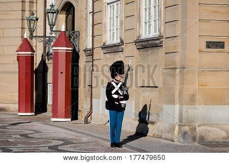 COPENHAGEN DENMARK - MARCH 11 2017: Amalienborg Palace Copenhagen. Royal Life Guards (Danish: Den Kongelige Livgarde) infantry regiment of Denmark Army founded in 1658 by King Frederik III