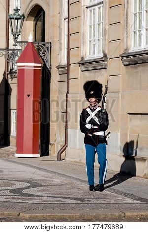 COPENHAGEN DENMARK - MARCH 11 2017: Amalienborg Palace Copenhagen. Royal Life Guards (Danish: Den Kongelige Livgarde) infantry regiment of Denmark Army founded in 1658 by King Frederik III