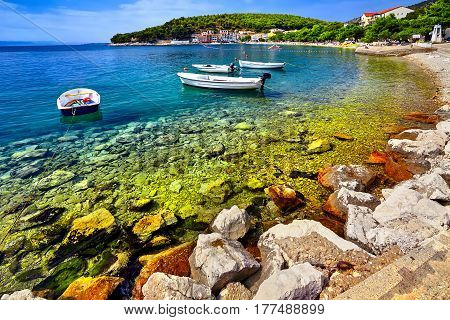 Beautiful Scene Of Boats Lying In The Harbor Of Drvenik At Sunset, Croatia, Adriatic Sea Beach. Arti