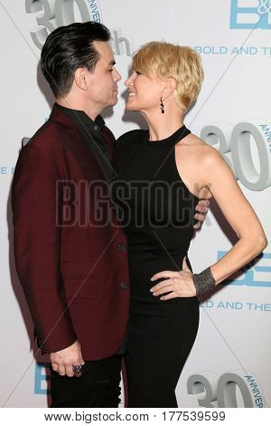LOS ANGELES - MAR 19:  Mick Cain, Schae Harrison at the 