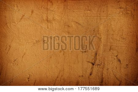 Old wall background in high resolution. Ocher stucco texture or background