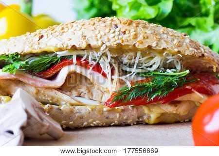 Sandwich with chicken on a whole-wheat bun
