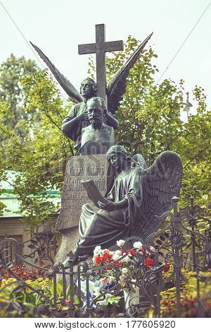 ST.PETERSBURG RUSSIA - AUGUST 04 2013: Tombstone to russian composer P.I. Tchaikovsky at Tikhvin Cemetery in St Petersburg. Necropolis of Alexander Nevsky Lavra.