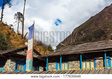 Rural Buildings of Mountain Village in Nepal handmade of stone and wood