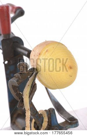 original old maschine apple peeler and potato made of metal