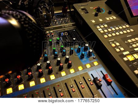 Stage lighting control panel for light technician to work at concert in night club.Scene lights controller mixer panel.Professional nightclub music show equipment editorial