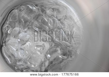 Bucket of crushed ice from top view of the glass