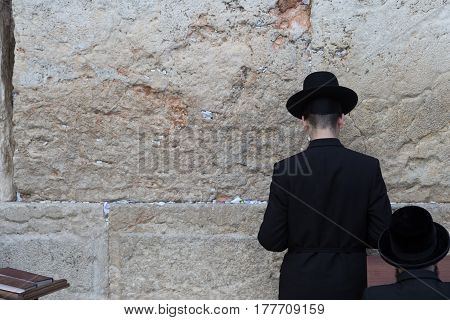 Jew praying at the Western Wall in Jerusalem