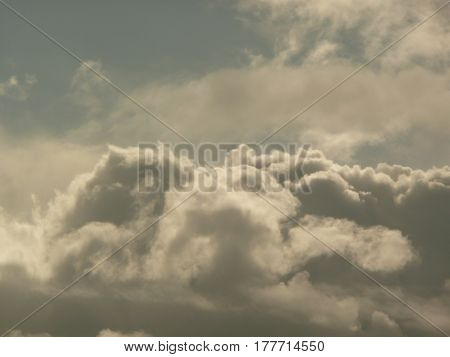 Dramatic shadowy cumulus clouds in sky over San Jose,California