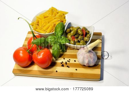 Pasta ingredients tomato garlic olives and basil healthy traditional food