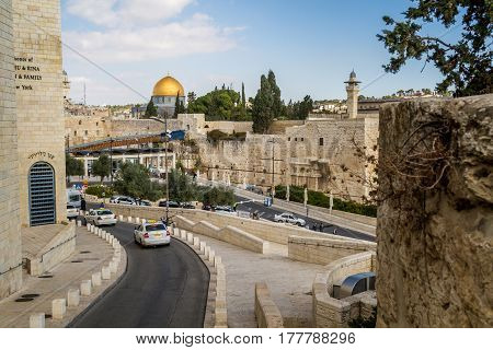 JERUSALEM, ISRAEL - DECEMBER 8: The Western Wall, the Dome of the Rock and the Mughrabi Gate on the Temple Mount, view from the wall in the Old City of Jerusalem, Israel on December 8, 2016